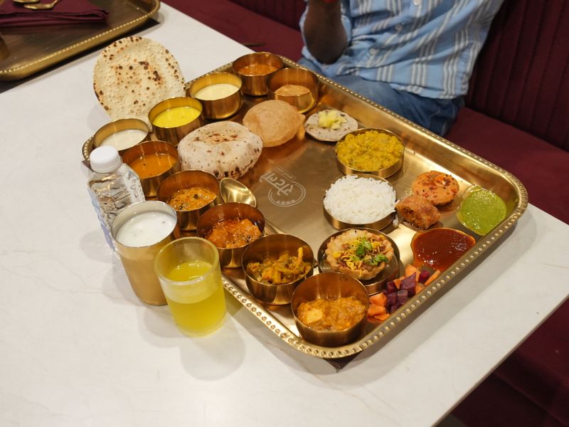 Full Gujarati thali on brass tray